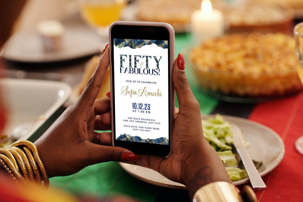 Person holding a phone displaying the customisable Gold White Blue Tropical | Fifty & Fabulous Party Evite from URCordiallyInvited.
