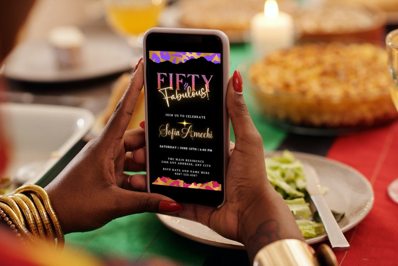 A person holding a smartphone displaying the customisable Purple Pink Gold Neon | Fifty & Fabulous Party Evite from URCordiallyInvited.