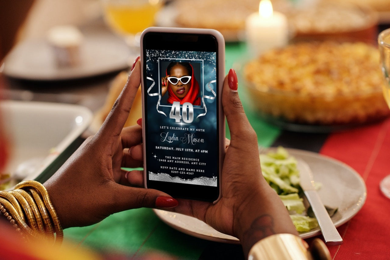 Person holding a smartphone displaying a customizable Navy Silver Glitter 40th Birthday Evite with a photo of a woman wearing a red scarf and sunglasses.