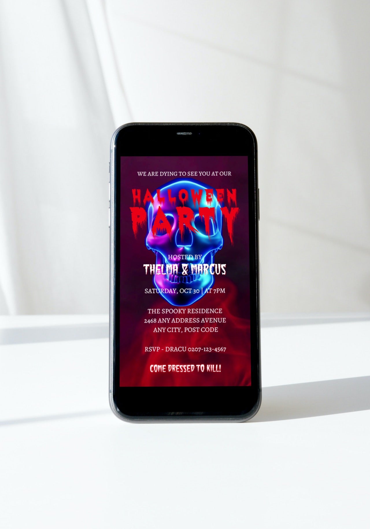 Digital editable Blue Smoking Neon Skull Halloween Party Video Invite displayed on a cellphone screen, featuring a spooky skull graphic and invitation text.