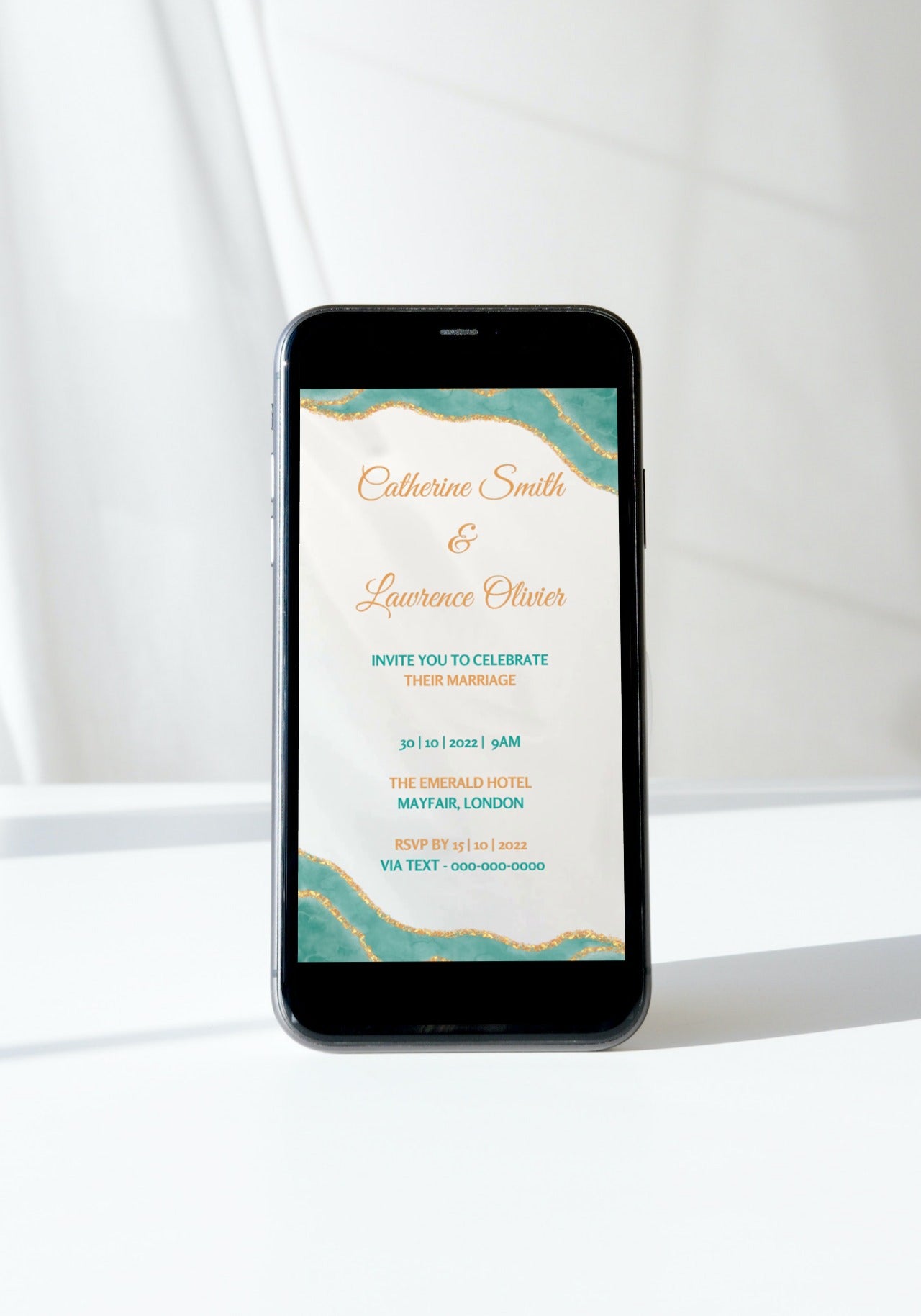 Teal Blue Agate wedding video invitation displayed on a smartphone, showcasing customizable text and design elements for easy personalization via Canva.