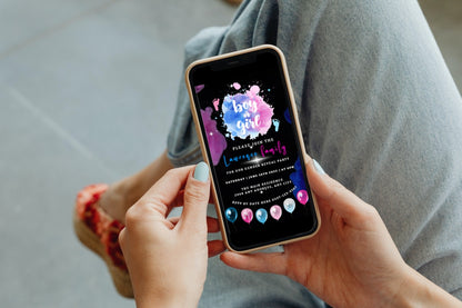 Person holding a smartphone displaying a customizable Dark Pink Blue Feet Cloud Gender Reveal Party Video Invitation template.