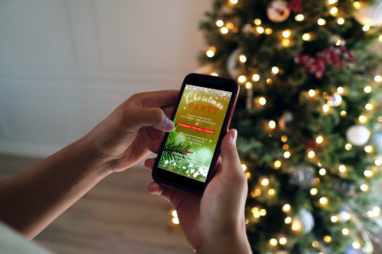 Person holding a smartphone displaying a customizable Green Red Gold Glitter Christmas Video Invitation from URCordiallyInvited.