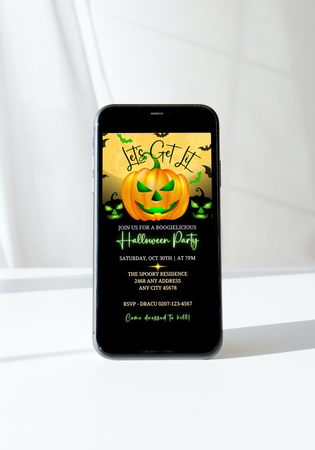 Cell phone showing a Halloween Evite with a green-faced pumpkin and text, emphasizing customizability via Canva for various celebrations.