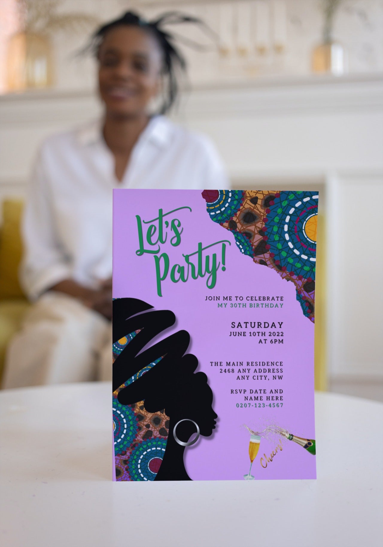 Editable Purple Ankara African Woman Silhouette Party Evite featuring a woman's silhouette, customizable via Canva for digital invitations.