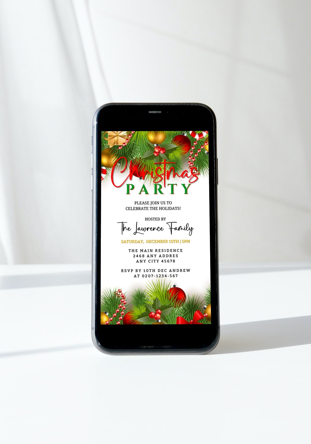 Cell phone displaying editable White Green Ornaments Christmas Party Invitation with customizable text, designed for use on smartphones, available from URCordiallyInvited.
