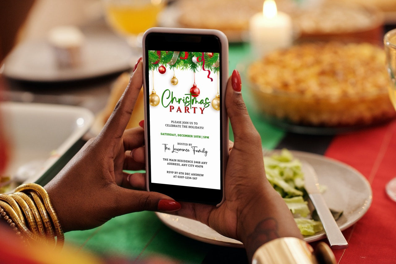 Person holding a phone displaying a customizable digital Christmas party invitation from URCordiallyInvited.