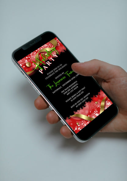 A hand holding a smartphone displaying a customizable digital holiday party invitation template titled Red Black Gold Ornament.