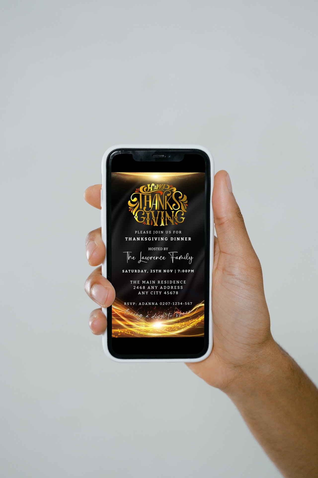 A hand holding a phone displaying the customizable Gold Neon Black Sparkle Thanksgiving Evite template from URCordiallyInvited.