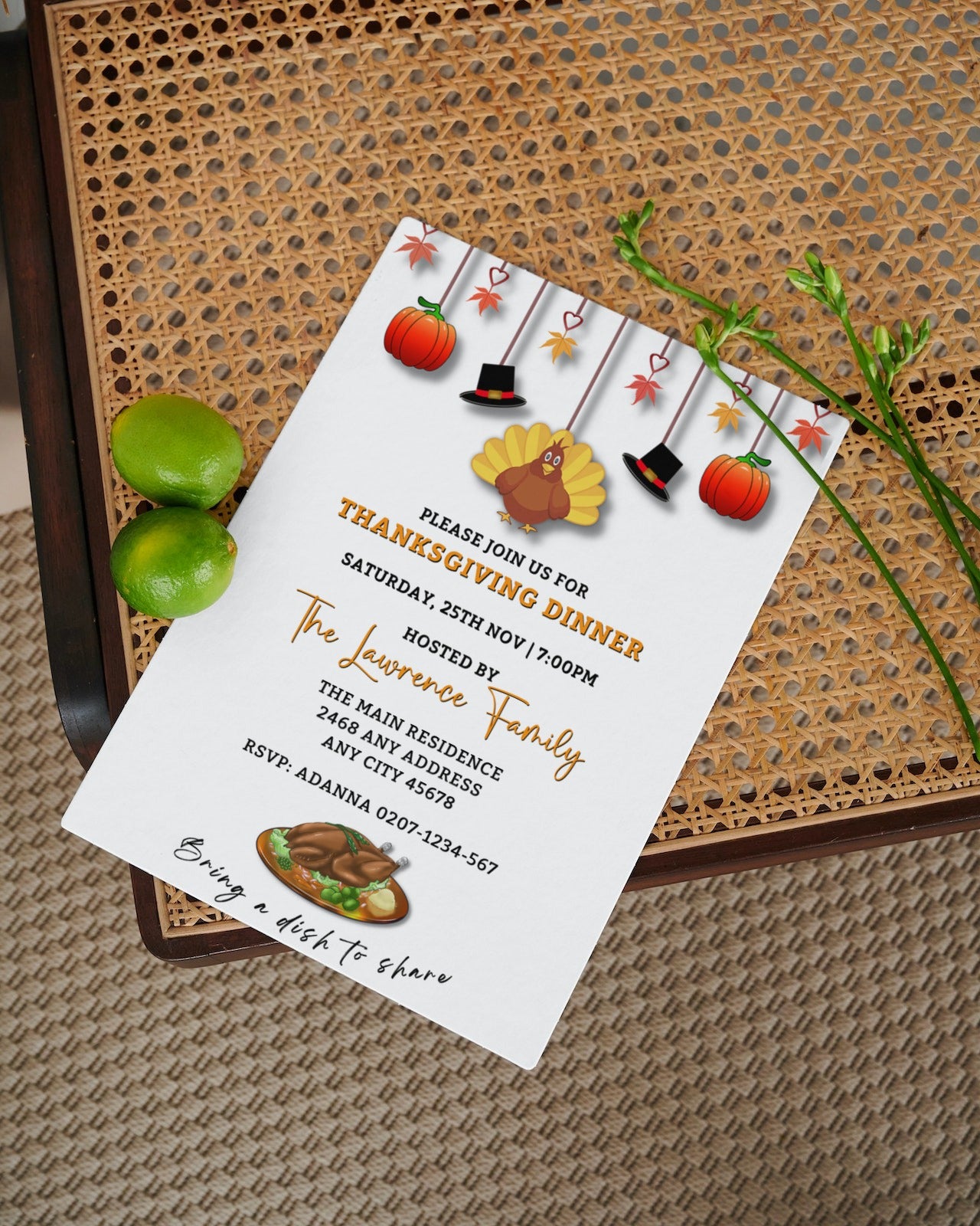 Turkey Pumpkin Decor | Thanksgiving Dinner Evite next to two limes, showcasing an editable digital and printable invitation template for personalizing with Canva.