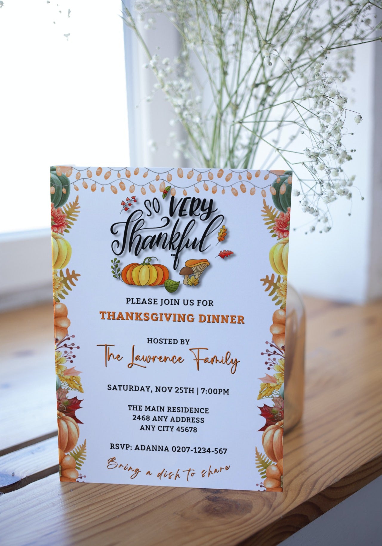 Invitation card featuring fall leaves and pumpkins for a customizable Thanksgiving Evite, editable via Canva for text, email, and messenger app sharing.