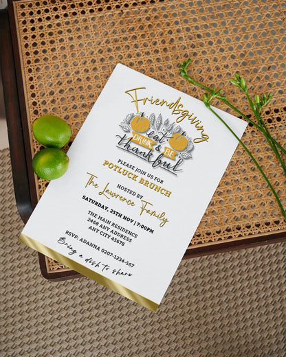 Elegant FriendsGiving Potluck | Thanksgiving Brunch Invitation on a wicker chair with two limes, customizable via Canva for personal use.
