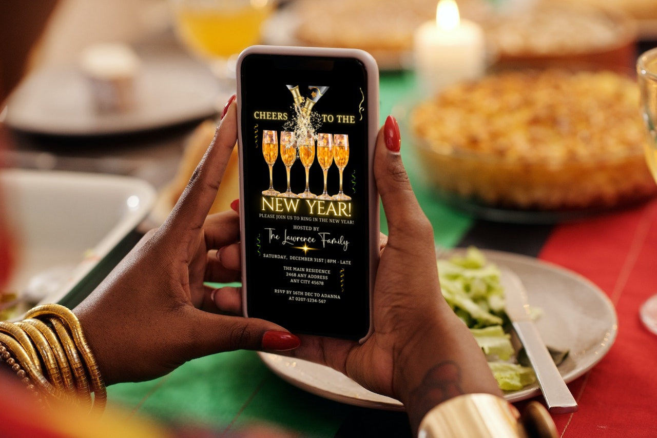 Person holding a phone displaying a Splashing Champagne Neon Cheers NY | New Years Party Evite on the screen for customization.