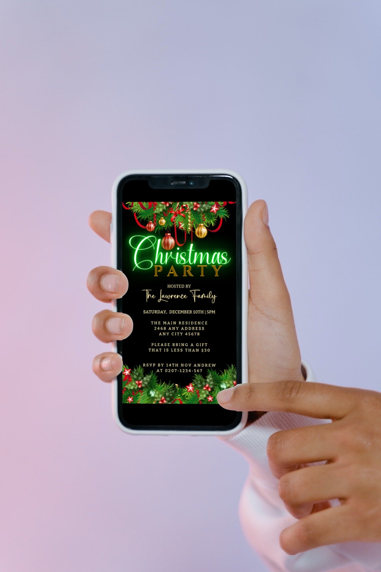 Hand holding smartphone displaying editable Green Neon Ornaments Border | Christmas Party Evite.