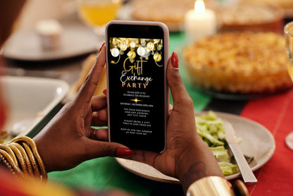 Person holding a phone displaying a customizable Black Gold White Ornaments Christmas Party Evite from URCordiallyInvited.