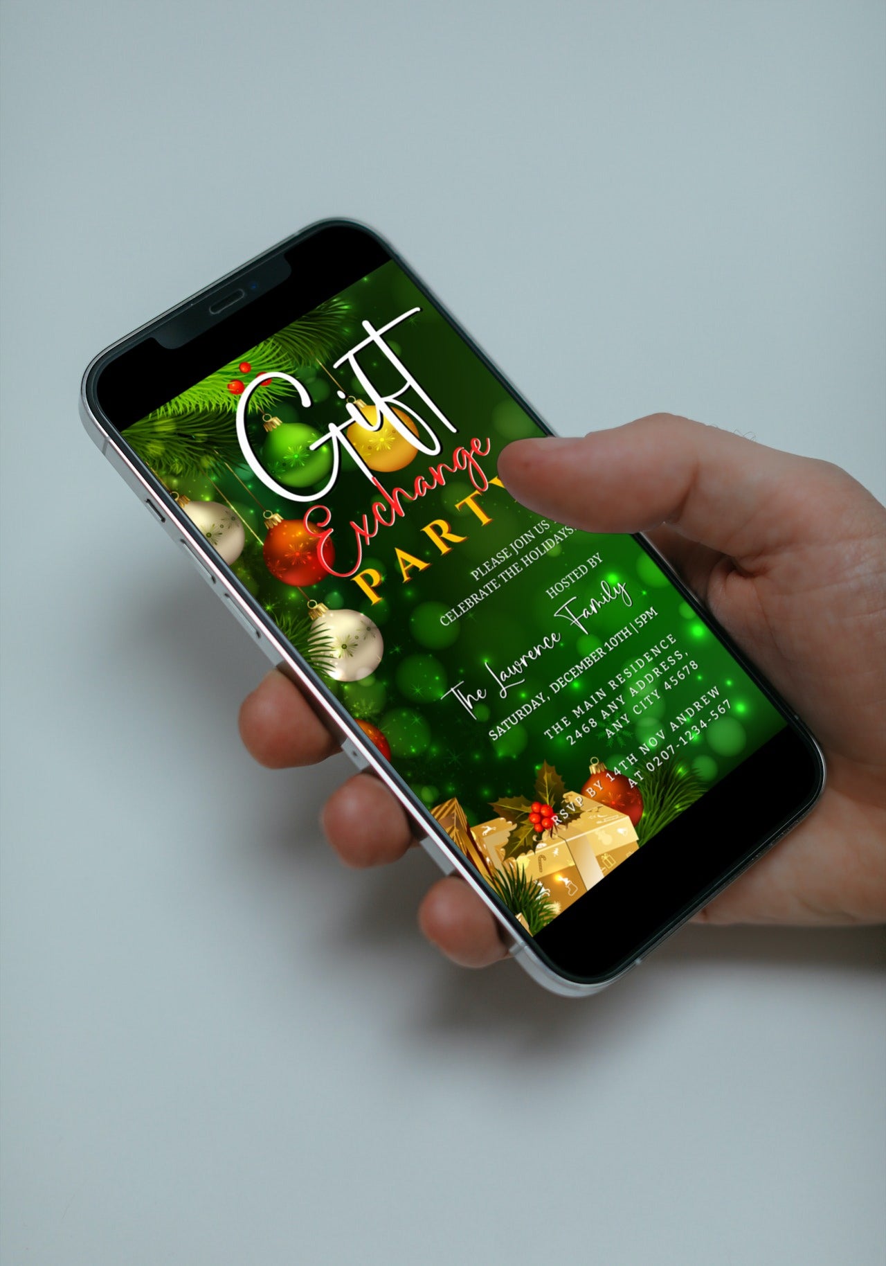 Hand holding a smartphone displaying an editable Green Yellow Red Presents | Gift Exchange Party Evite template for customization via Canva.