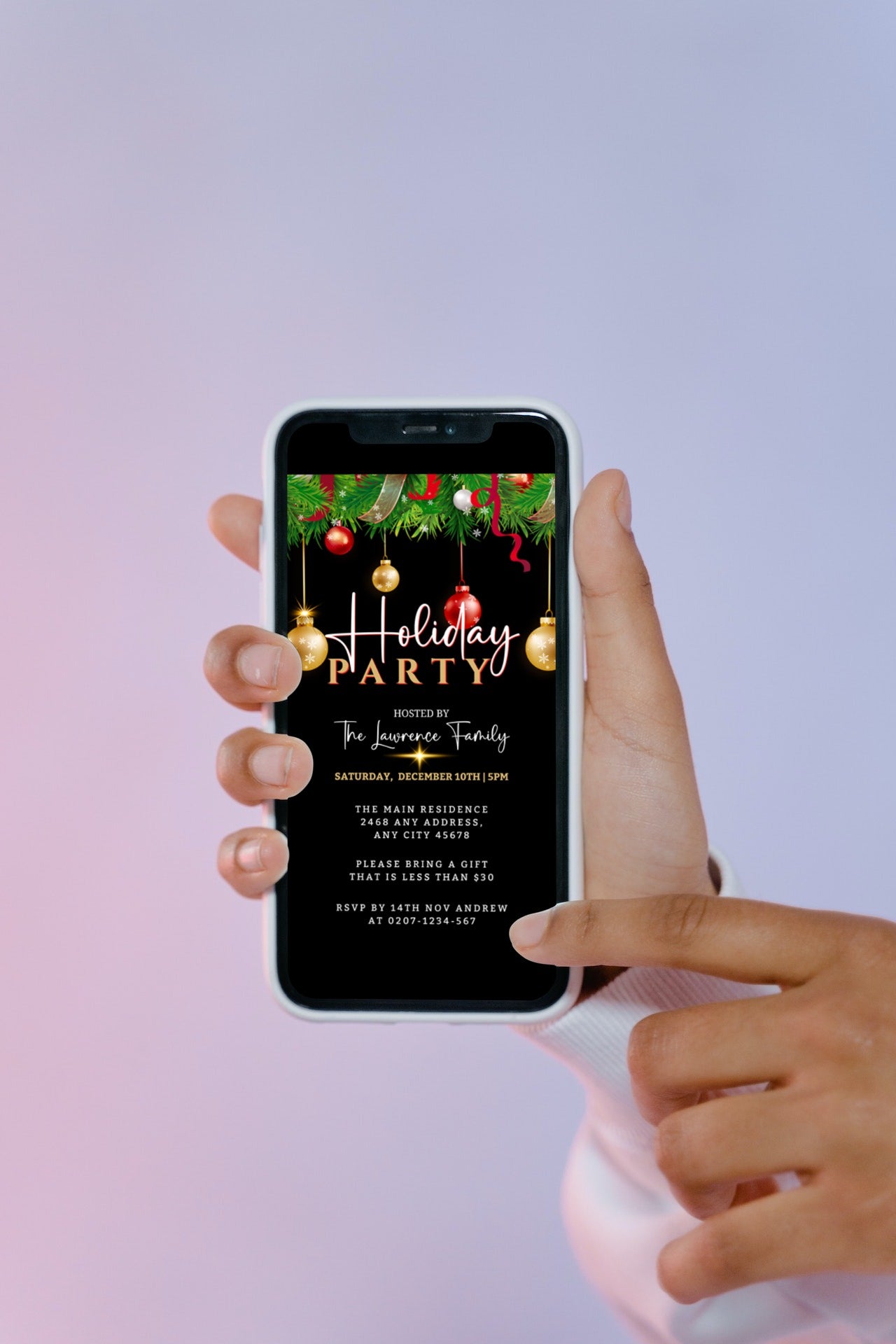 Hand holding a phone displaying a customizable digital invitation template titled Gold Red Green Ornaments | Holiday Party Evite from URCordiallyInvited.