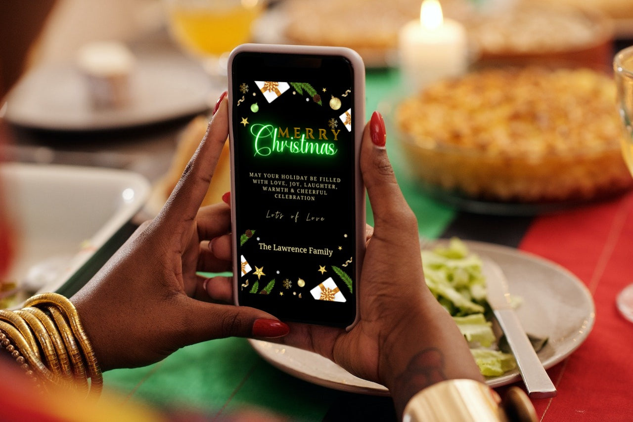 Person holding a phone displaying a customizable Green Neon Ornaments & Presents Merry Christmas Ecard from URCordiallyInvited, designed for easy DIY personalization using Canva.