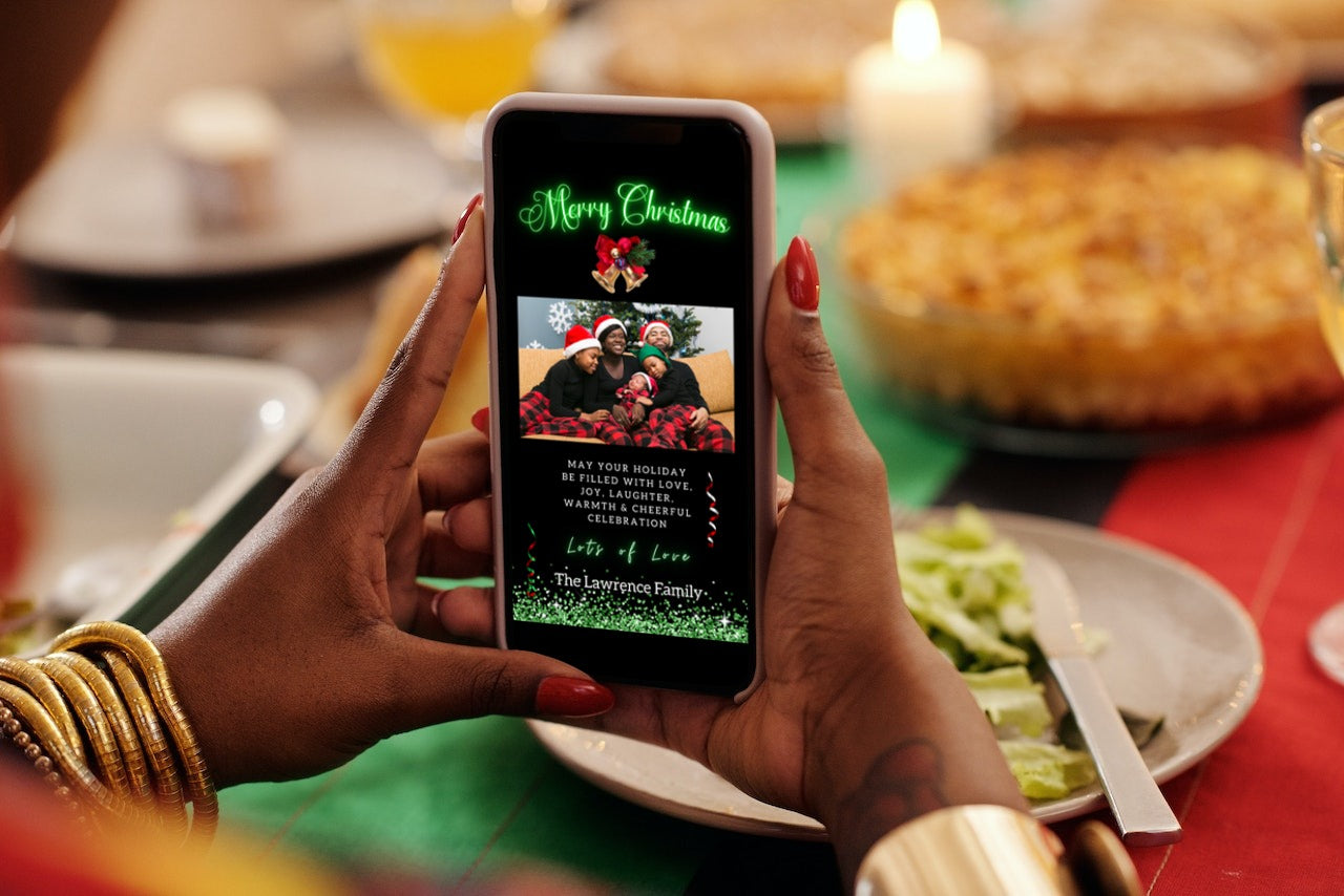 Person holding a smartphone displaying a Merry Christmas eCard with a family photo, part of the Black Neon Green customizable digital invitation collection.