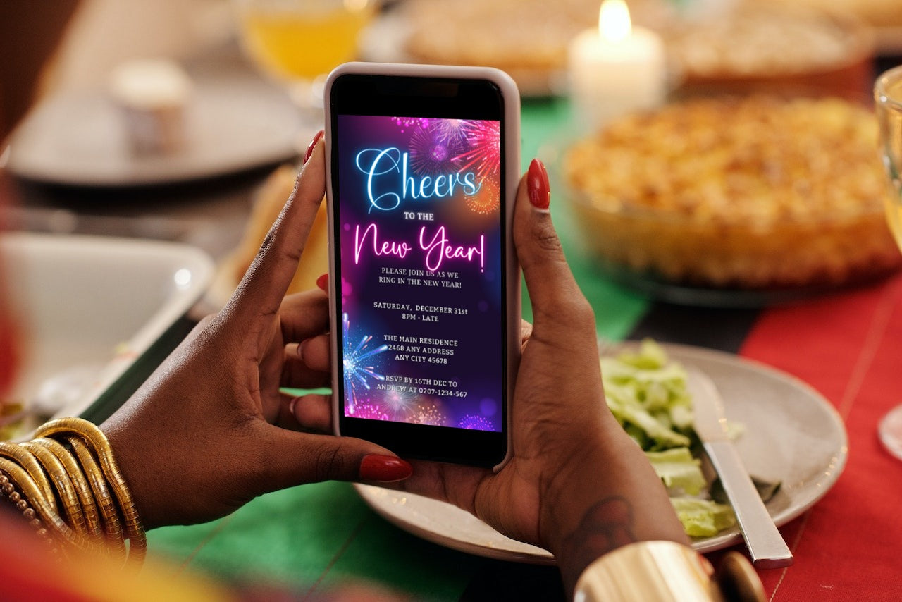 Person holding a smartphone displaying a lit-up digital New Year's 2024 party invitation from URCordiallyInvited, customizable via Canva for easy electronic sharing.