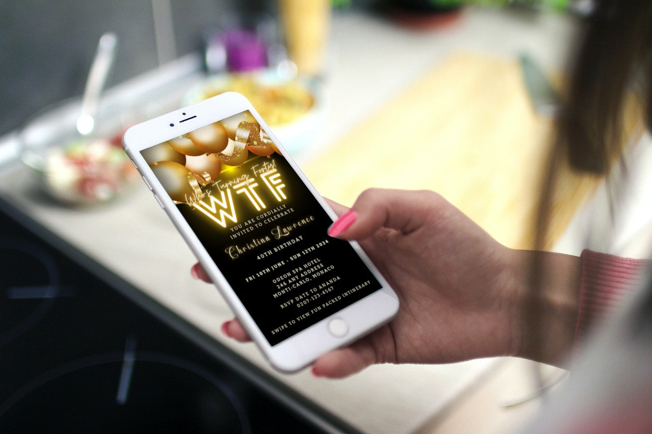 Hand holding a smartphone displaying a customizable Black Neon Gold Floating Balloons | WTForty Weekend Evite birthday invitation template.