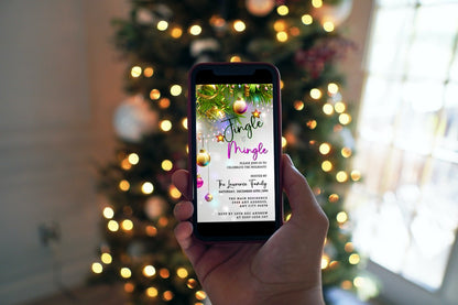 Hand holding a phone displaying the Editable Digital Jingle & Mingle Rose Gold Christmas Party Invitation, with a Christmas tree in the background.