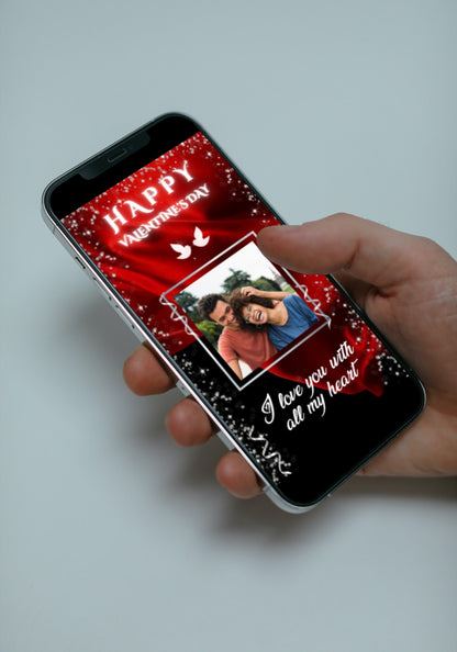 Hand holding a smartphone displaying a customizable Red Flowing Fabric Valentine's Ecard from URCordiallyInvited, editable via Canva for digital sharing.
