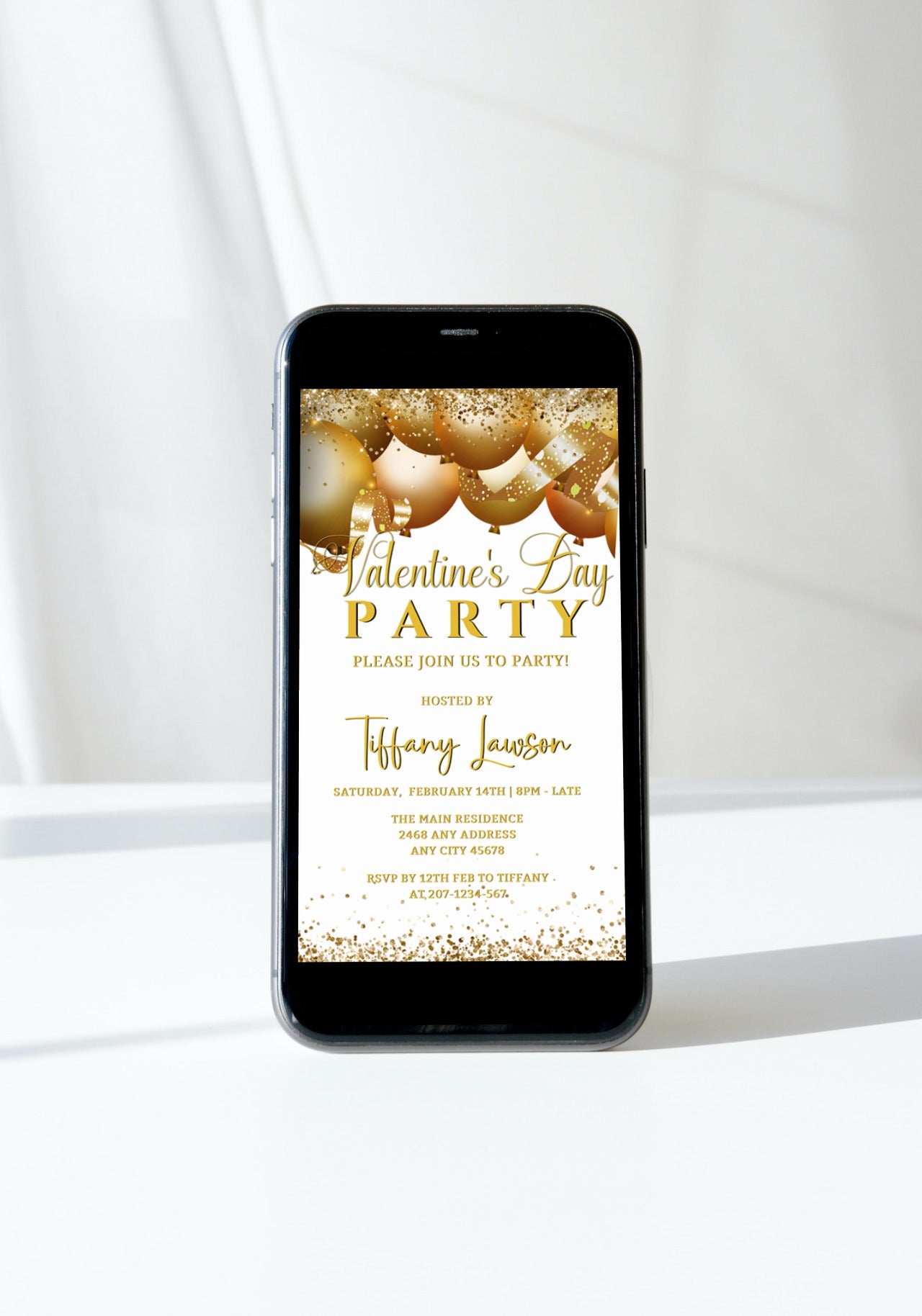 Smartphone displaying an editable White Gold Glitter Balloons Valentine's Party Evite template, showcasing ease of customization for digital invitations.