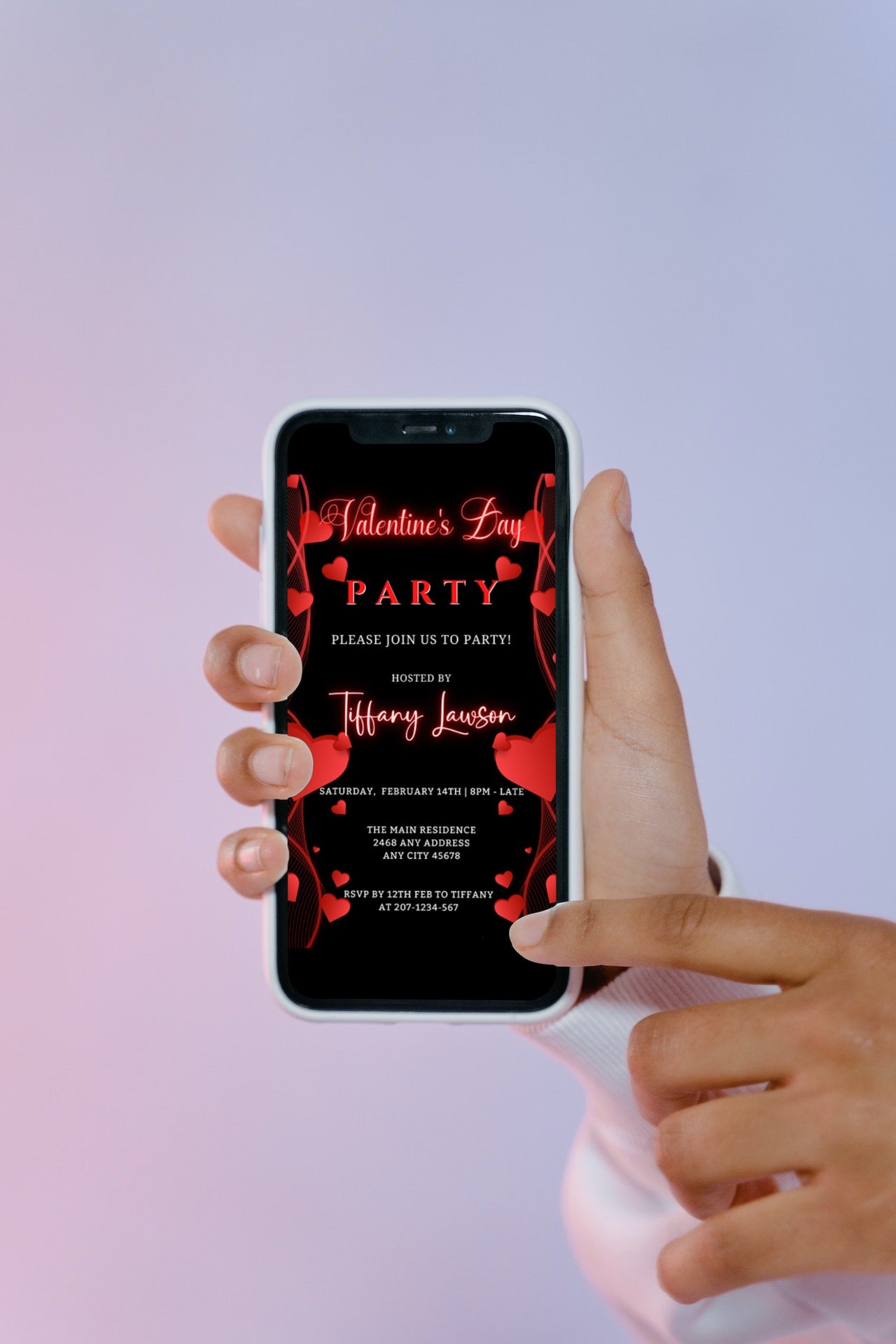 Hand holding a smartphone displaying the Black Neon Red Border Hearts | Valentines Party Evite, customizable with Canva for digital invitations.