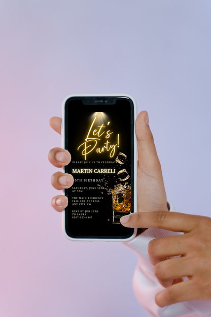 A hand holding a smartphone displaying a customizable Gold Neon Splashing Cubes Party Evite template from URCordiallyInvited.