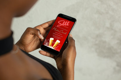 Person holding a smartphone displaying a customizable Men's Red Neon Beer Splash Surprise Birthday Evite, downloadable and editable via Canva for electronic invitations.