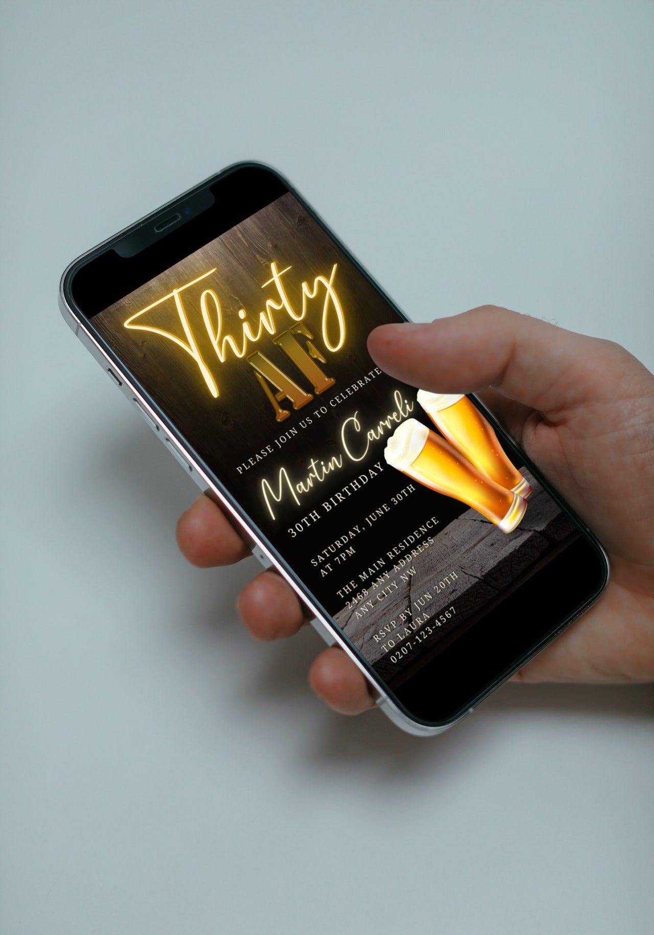 Hand holding a smartphone displaying the Neon Gold Beer | 30AF Birthday Evite, a customizable digital invitation template available for instant download and personalization.