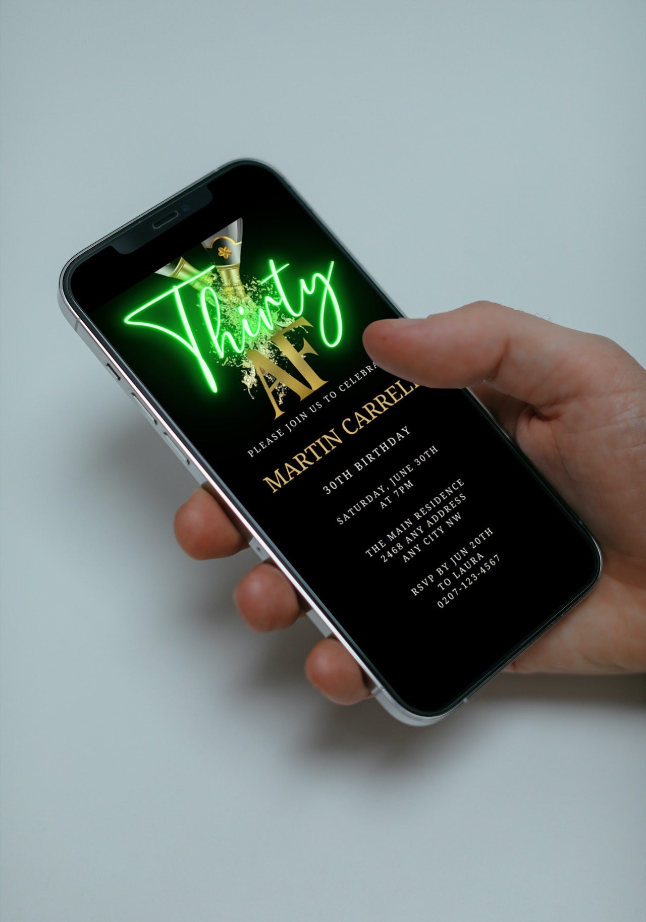 Hand holding a phone displaying a customizable Black Gold Champagne Neon Green | Thirty AF Party Evite for personalizing and sending via smartphone.