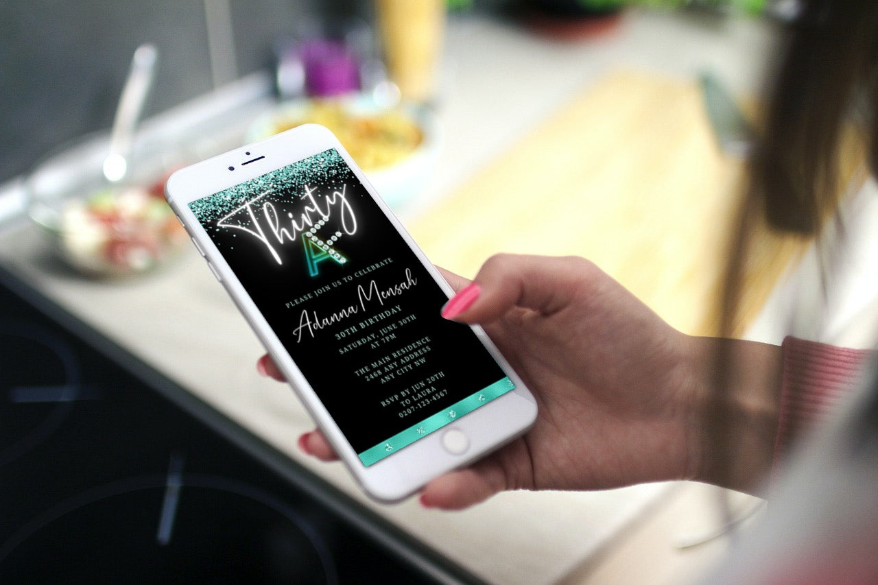 Hand holding a smartphone displaying a customizable Black Teal Confetti Diamond 30AF Birthday Evite from URCordiallyInvited, editable via Canva for digital sharing.