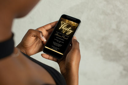 Person holding a smartphone displaying the customizable Black Gold Neon Sparkle 30AF Birthday Evite template from URCordiallyInvited.