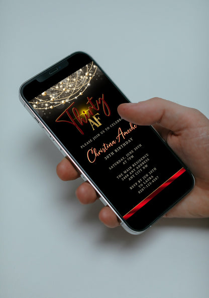 Hand holding a smartphone displaying a customizable Black Red Neon Art Deco Bling| 30AF Birthday Evite, designed for easy personalization and digital sharing via Canva.