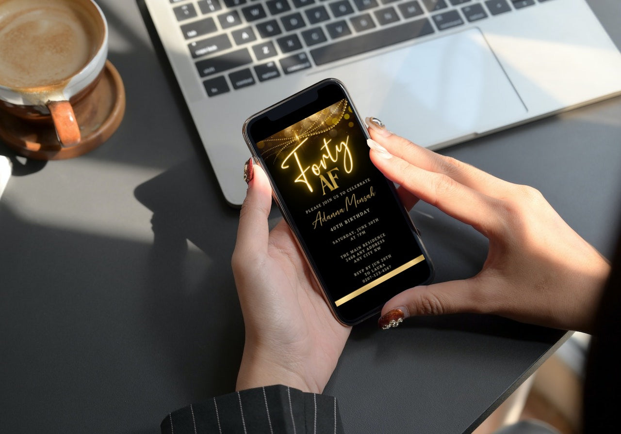 Person holding a smartphone displaying the Black Gold Neon Sparkle | 40AF Birthday Evite customizable digital invitation template.