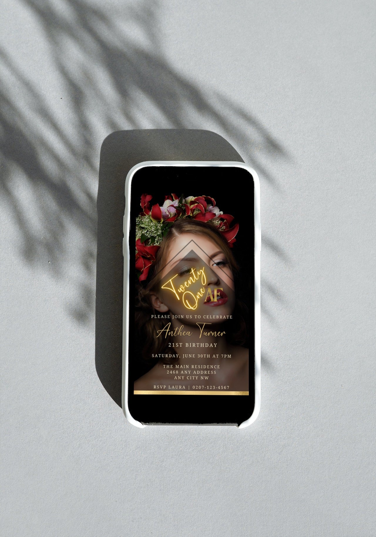 Photo Background Gold | 21AF Birthday Evite displayed on a smartphone screen, featuring a woman's face with flowers in her hair, ready for customization via Canva.