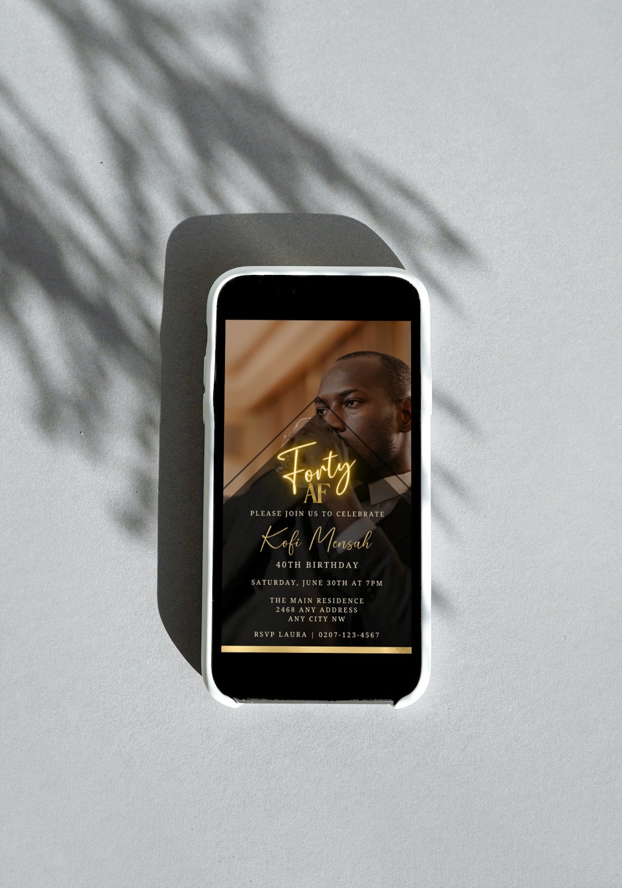 Customizable digital invitation template displayed on a smartphone, featuring a man's photo for the Gold Neon With Photo Background | Forty AF Party Evite.
