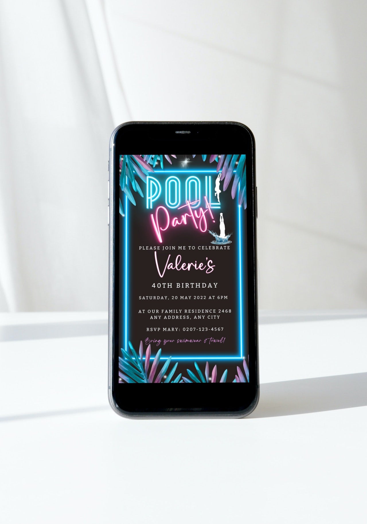 A cell phone displaying a customizable BBQ Swim Pool Party digital invite with neon text and floral design, editable via Canva for smartphone use.