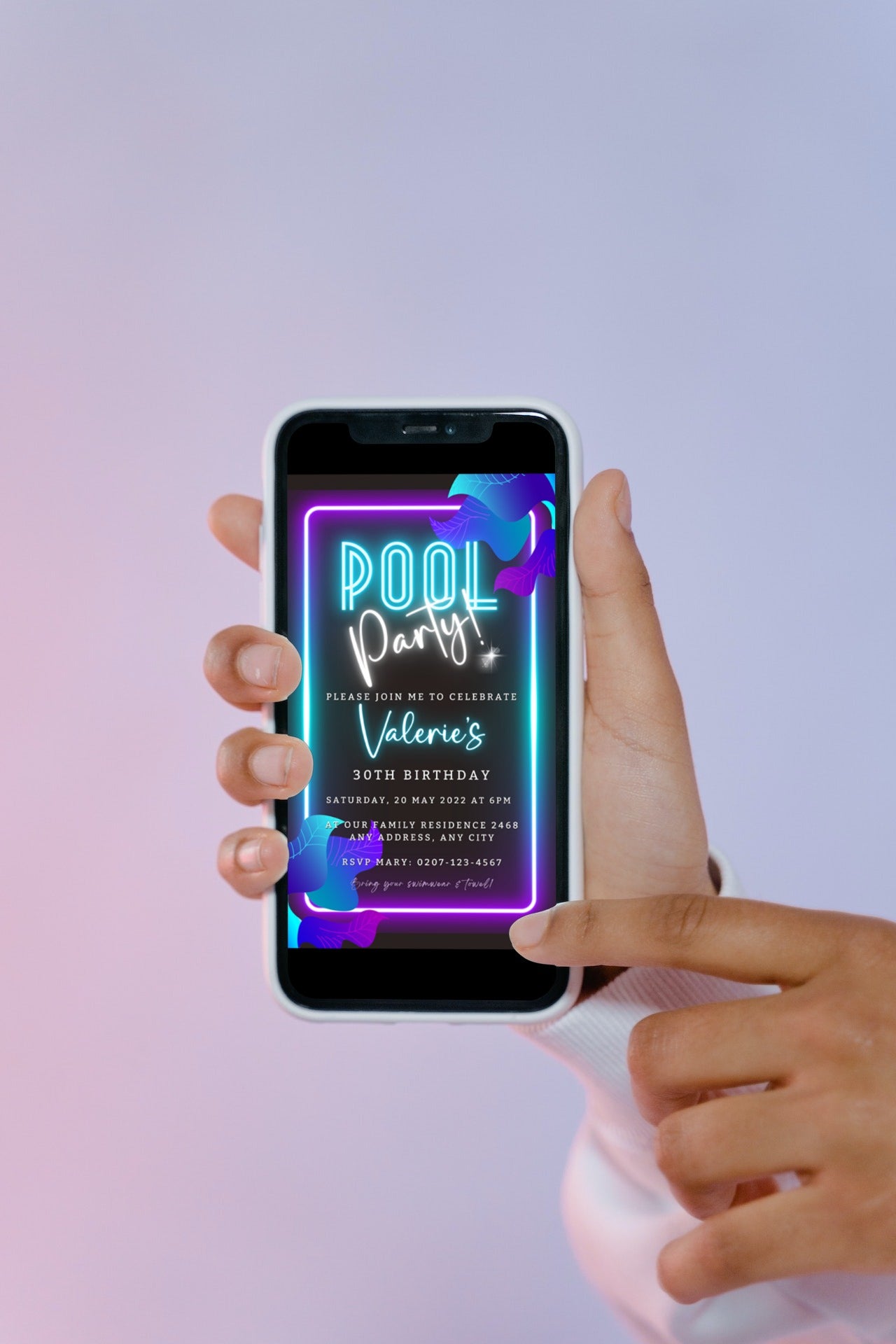 Hand holding a phone displaying a customizable Neon Pool Party digital invite template for smartphones, available from URCordiallyInvited for DIY editing with Canva.