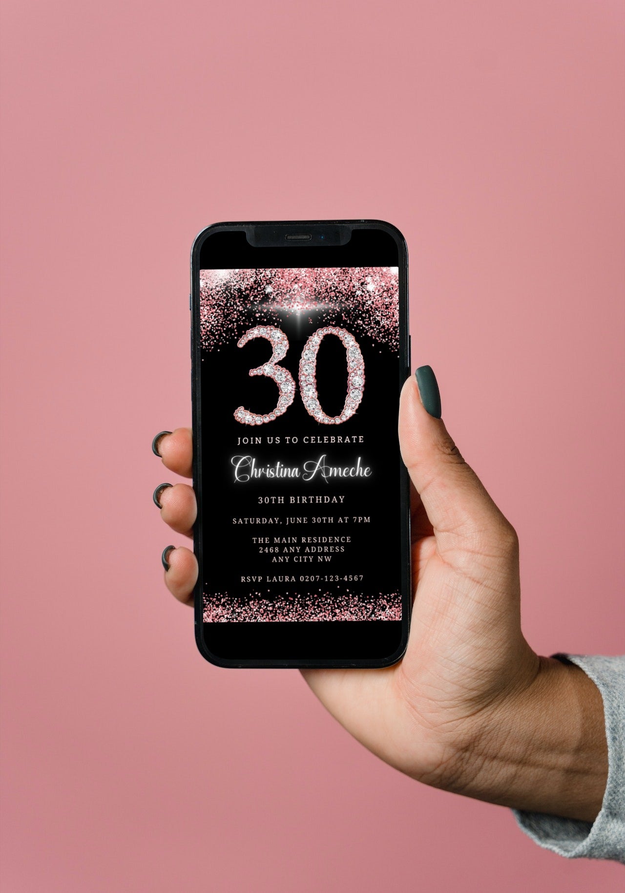 A hand holding a smartphone displaying a customizable Rose Gold Glitter Diamond 30th Birthday Evite from URCordiallyInvited.