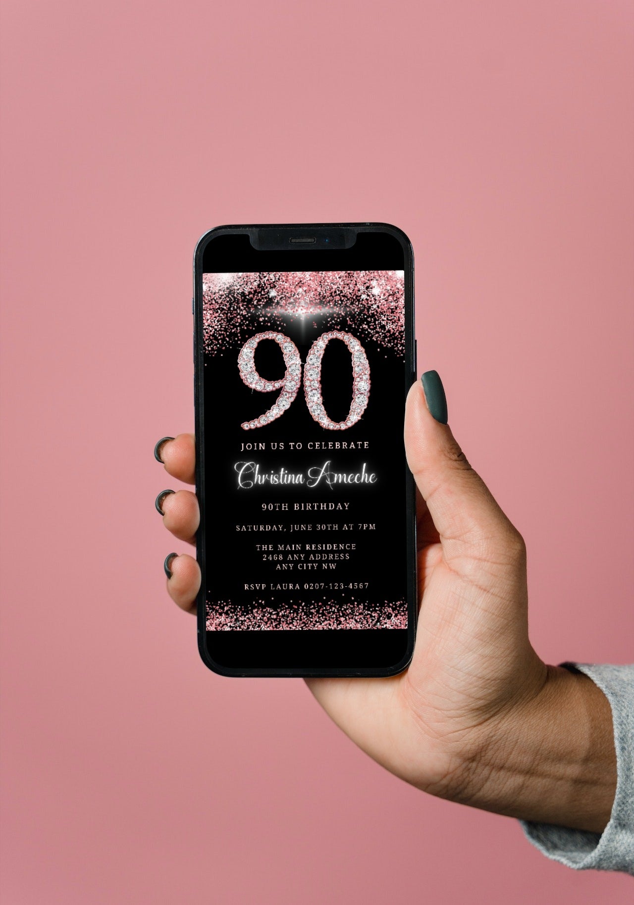 Hand holding a smartphone displaying a customizable Rose Gold Diamond Glitter 90th Birthday Evite from URCordiallyInvited, ready for personalization via Canva.