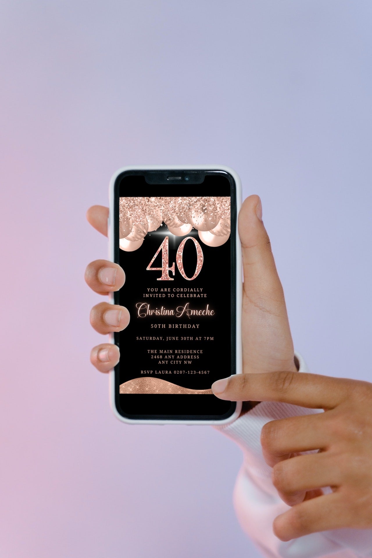 Hand holding a smartphone displaying a customizable Rose Gold Balloons Glitter 40th Birthday Evite template from URCordiallyInvited.