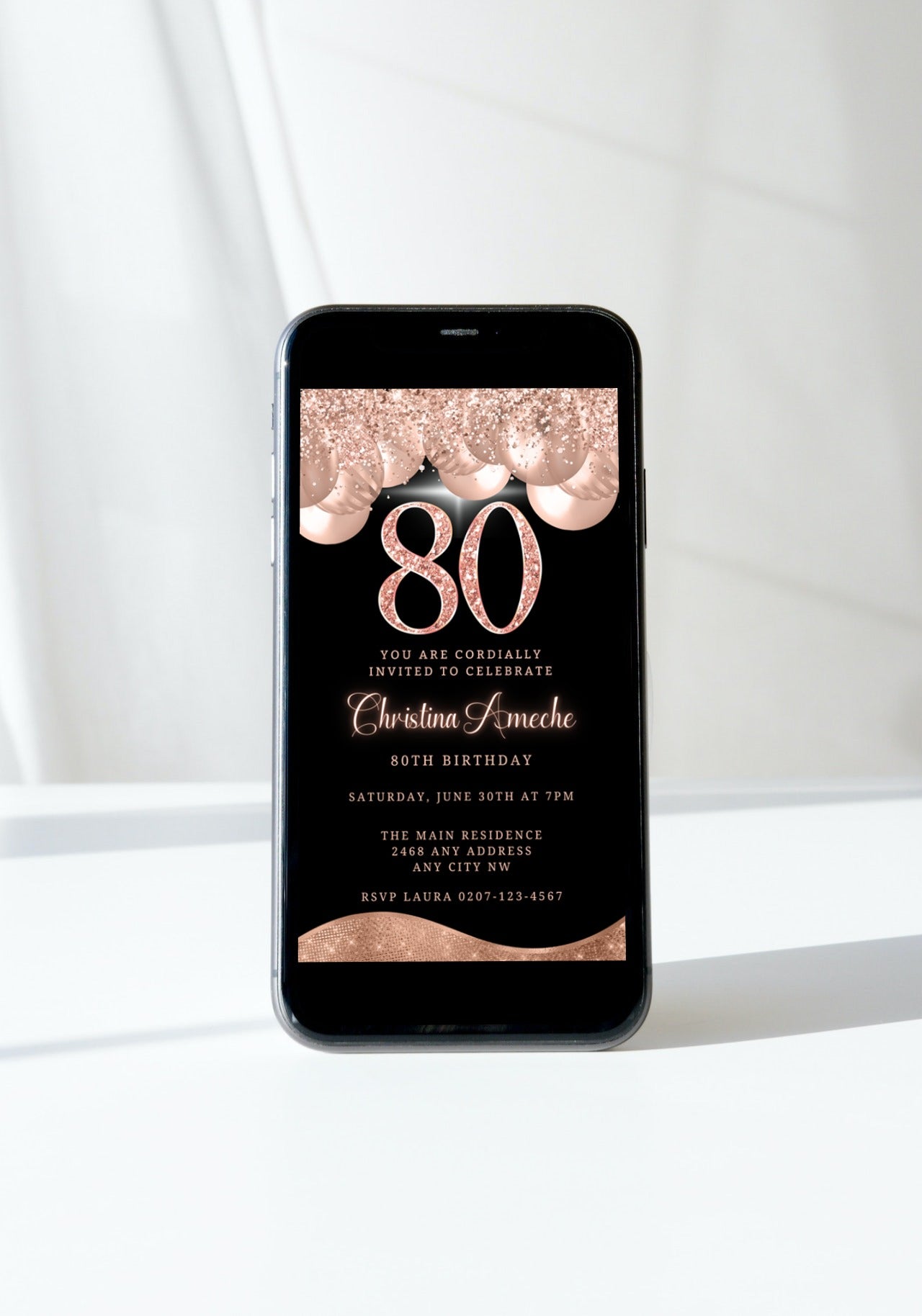 Customizable Rose Gold Balloons Glitter 80th Birthday Evite displayed on a smartphone, ready for personalization and electronic sharing via Canva.