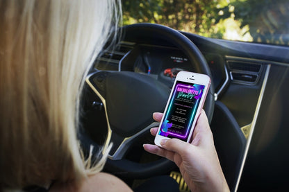 Woman in a car holding a phone displaying a customizable digital Bachelorette Getaway Party Evite in Neon Pink Aqua Black.