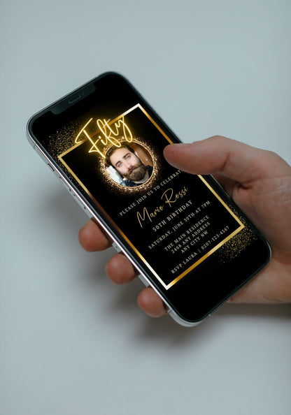 Hand holding a smartphone displaying a customizable Neon Gold Oval Photo Frame | 50th Birthday Evite, editable via Canva for digital invitations.