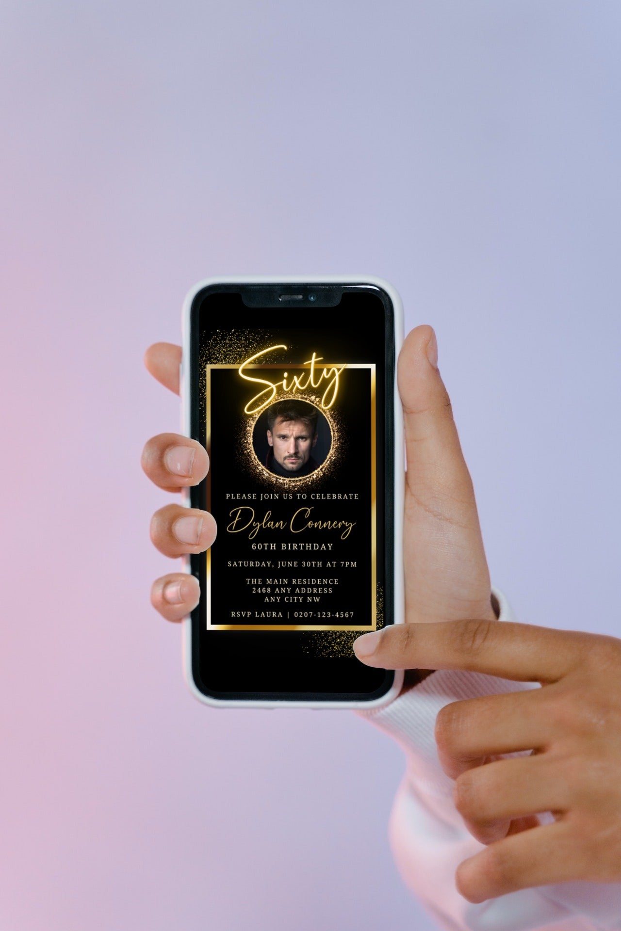 A hand holding a phone displaying a customisable Digital Neon Gold Oval Photo Frame for a 60th Birthday Evite.