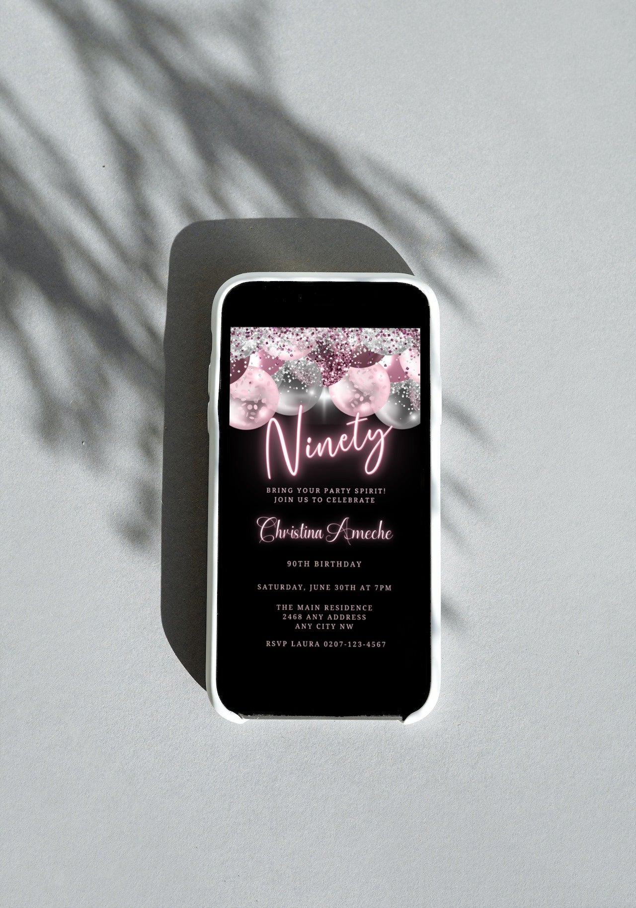 A customizable Mauve Pink Silver Neon 90AF Birthday Evite on a smartphone screen, displaying event details with pink and silver design elements.