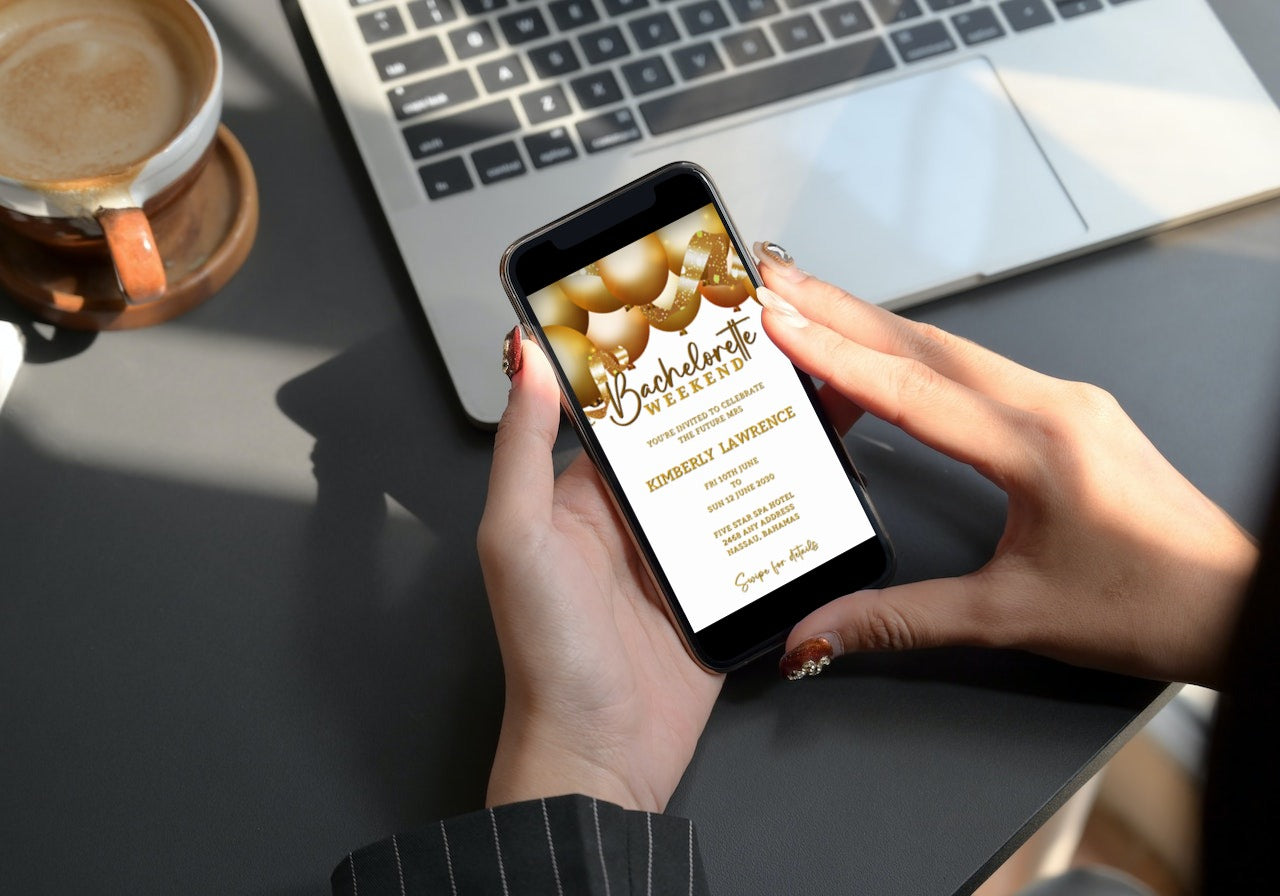 Person holding a phone displaying a customisable digital invitation with gold floating balloons for a bachelorette weekend, created by URCordiallyInvited.